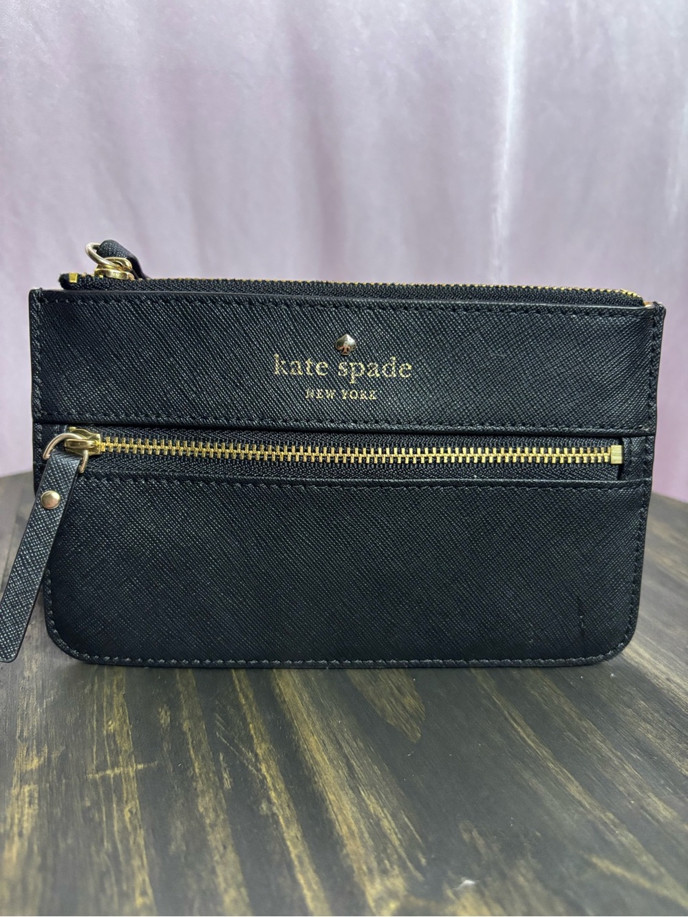 kate spade black leather zip wristlet with front pocket